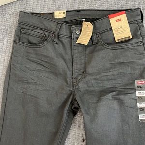 Levi’s SLIM stretch, men pants, and gray. Size 32x30 never worn with tag